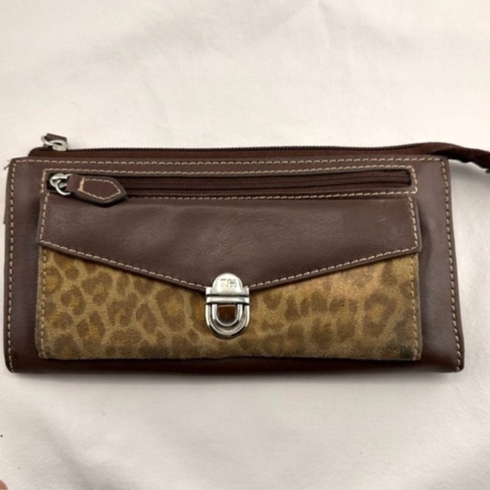 Brown and leopard print wallet. Tear present interior. Please see photos.
